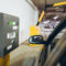 parking barrier. man taking ticket to pass control on parking area